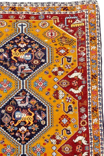 Handwoven rug from Fars Province, Iran, showcasing intricate patterns, vibrant colors, and artisanal craftsmanship.