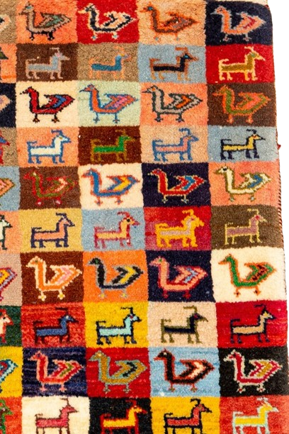 Image showing a vibrant Gabbeh rug with geometric patterns and a delightful array of colors.