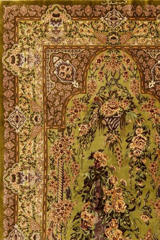 "Emerald Garden" hand-knotted silk rug with olive green background, floral designs, and regal brown border with golden accents, crafted in Qom, Iran.