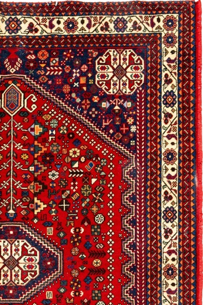 Image of the Persian Elegance rug showcasing rich deep red color and intricate patterns.