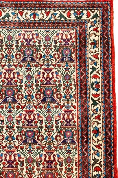 Antique handwoven rug from Fars Province, featuring intricate patterns and traditional Persian motifs.