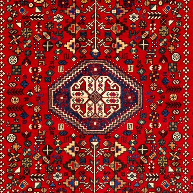 Image of the Persian Elegance rug showcasing rich deep red color and intricate patterns.