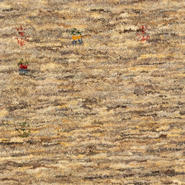 Image showing a stunning Gabbeh rug with sand brown color and charming motifs.